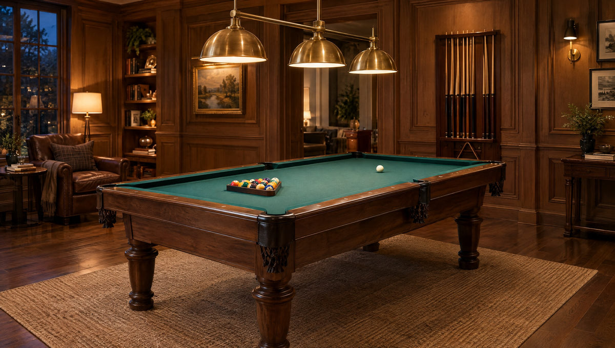Elegant home game room with a hardwood pool table under brass pendant lights